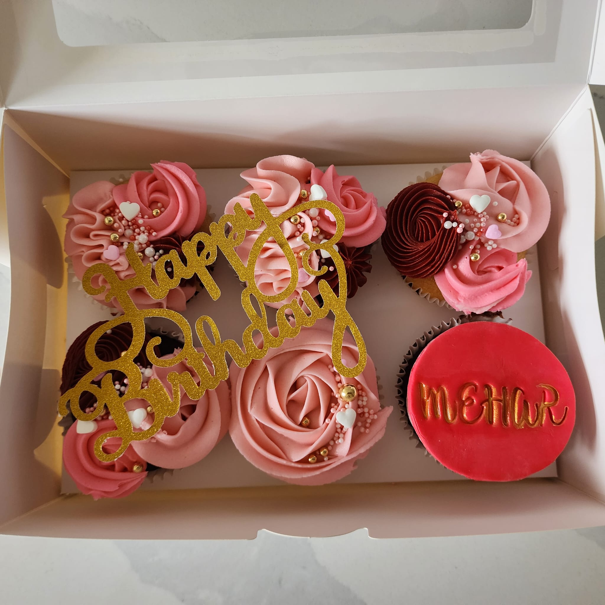 Hand-piped custom cupcakes