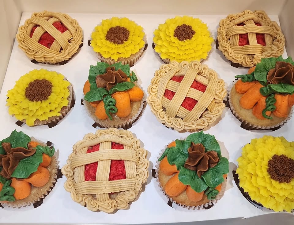 Autumn cupcakes decorated as pies, pumpkins, and sunflowers