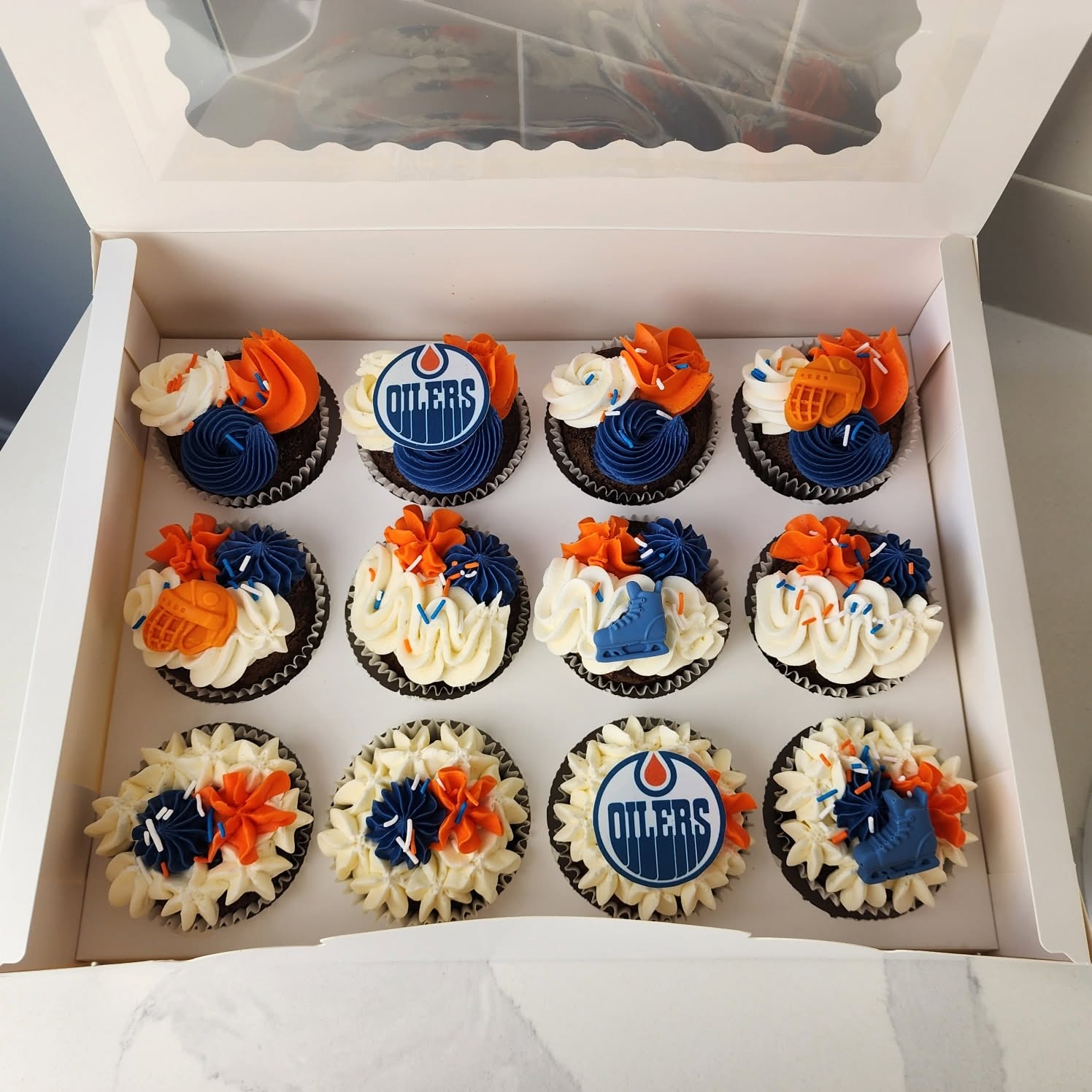 Celebration cupcakes with custom decorations